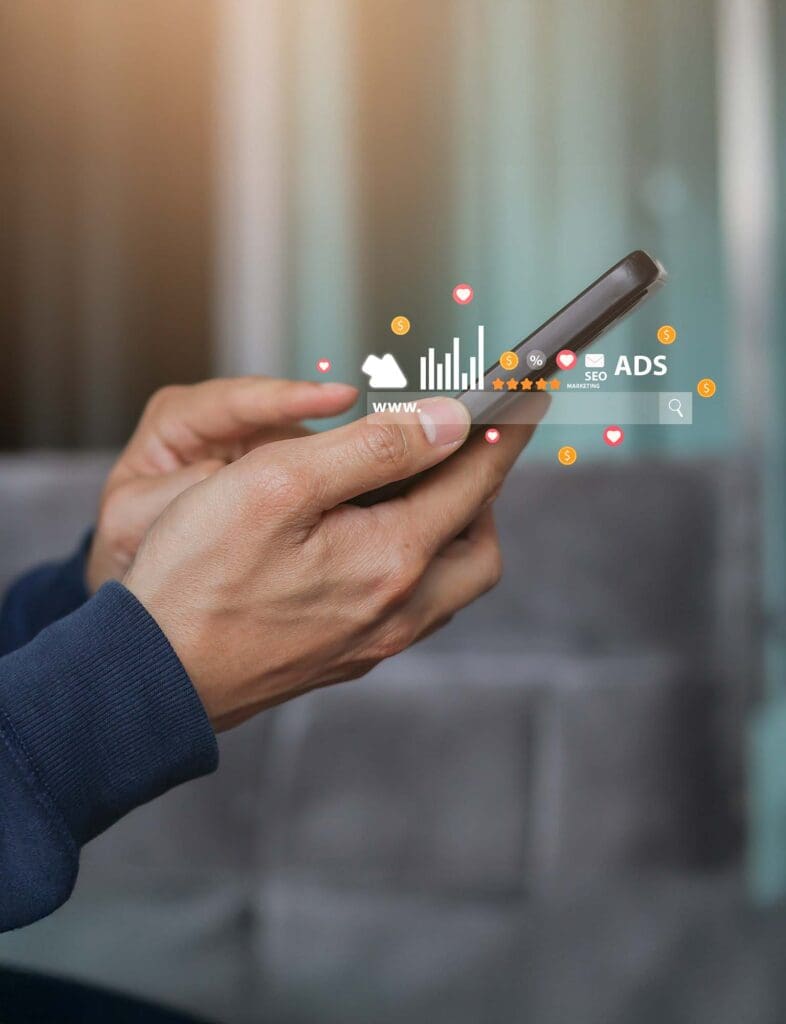 Hands holding a phone with data flowing out to represent Amazon sellers managing PPC